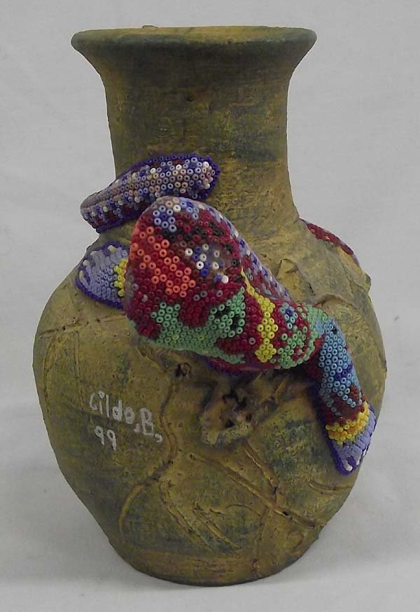 Mexican Huichol Indian Pottery Jar w/Beaded Lizard: Mexican Huichol Indian Pottery Jar w/Beaded Lizard. Fantastic art piece with a lizard seeming to have entered into the jar and emerged partially out the other side. The lizard is covered in glass bead