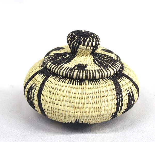 Wounaan Indian Basket: Wounaan Indian Basket from Darien Rain Forest, Panama, lidded and tightly woven, dark brown and buff, measures approx. 3.25''D x 2.5''H.
