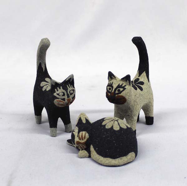 Balinese Hand Carved Cat Figures: Balinese Hand Carved Cat Figures, hand carved Albezia wood cats covered with a coat of natural sand from the beaches in Bali, black sand is from the north of the island, natural tone sand is from the 