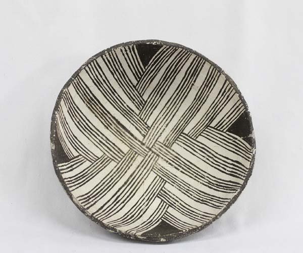 Mimbres Black on White Eyedazzler Geometric Bowl: Mimbres Black on White Eyedazzler Geometric Bowl. Picture is included with bowl prior to restoration. This Bowl was glued from four large pieces with minor flake restoration. Estimated less than 1%. N