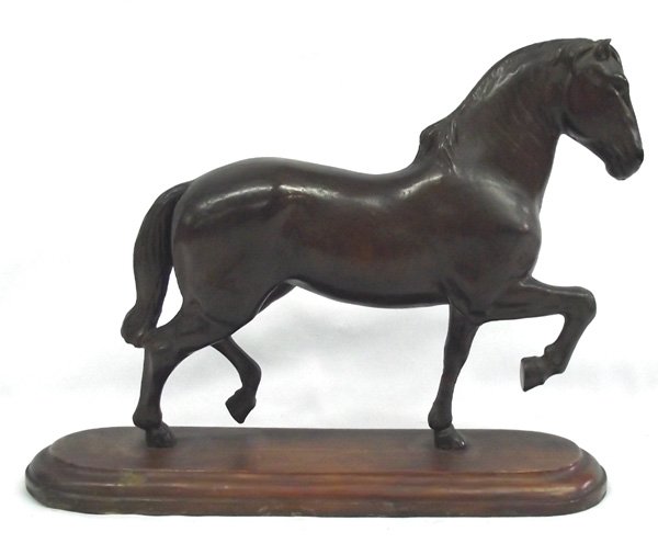 Carved Wooden Horse Statue: Carved Wooden Horse Statue, horse is carved from one piece, in prancing position, sitting atop wooden base, beautifully carved, measures approx. 13''L x 9.75''H x 3 5/8''W