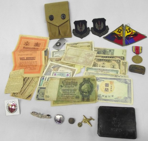World War II Memorabilia Includes Sterling Pins: World War II Memorabilia, #1 Canvas Pouch marked E-1883, Oct. 1918, Mills, Pat. July 16, 1907, #2 Old money from Germany, England, Belgium, Oriental (China), France, and Italy, #3 four Patches of whic