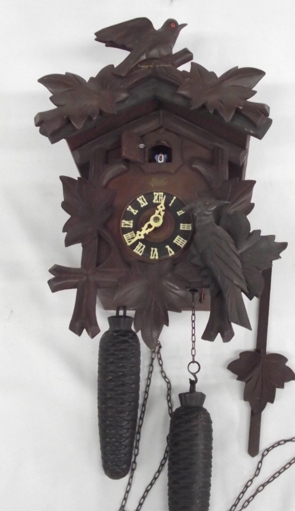 German Vintage Wooden Schatz, 8 Day Cuckoo Clock: German Vintage Wooden Schatz, 8 Day Cuckoo Clock. Has been repaired. Schatz introduced their first cuckoo clocks in 1950. They are 8-day clocks with time and cuckoo (no music). The case designs includ