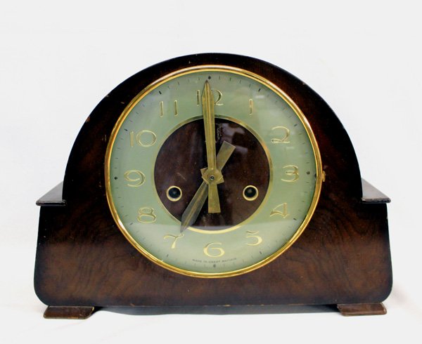 Vintage Smiths Mantle Clock Made in Great Britain: Vintage Smiths Mantle Clock Made in Great Britain. There is no key with this clock, but it appears to be in good condition otherwise, with some scratches on the wood finish. It measures 8.5''Hx11.25''