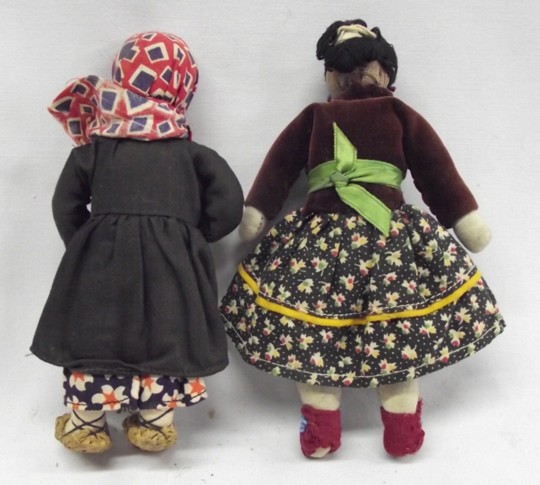 Pr Ethnic Handmade Dolls: Two Handmade Dolls 1() A Navajo woman doll has turquoise colored beads on moccasins and jewelry. 2) A Soviet peasant in traditional clothing. Original tag under coat. 6.5''H x 2.5'' W