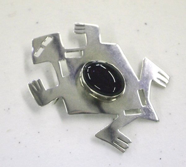 Sterling Silver Jet Horny Toad Pin - Reed: Sterling Silver Jet Horned Toad Pin by Silver City, NM artist Diane Reed. Sterling Silver body with a Jet cabochon. The artist is Diane Reed, a noted Silver City, NM silversmtih. He measures 2 5/8'' x