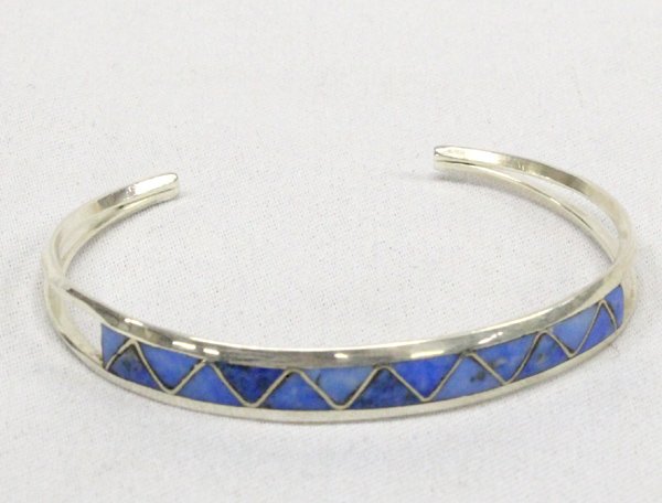 Vintage Sterling Denim Lapis Bracelet--Hayes: Vintage Estate Native American Sterling Inlay Denim Lapis Bracelet--hallmarked ''RM'' for Robert Hayes and stamped ''sterling'', double wire, 9 grams total weight, 3/8''W x 6.50'' inside measurement.