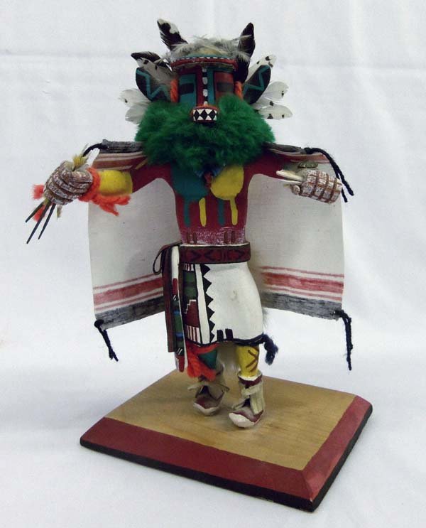 Zuni Hemis Kachina: Zuni Hemis Kachina. The Hemis Kachina is the homecoming kachina or the indicator of the mature corn for the tribe. 11''H x 8'' W, this colorful kachina is a favorite for collectors.Base is signed.