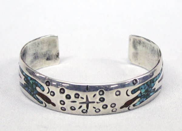 Zuni Turquoise Coral Chip Inlay Bracelet: Zuni Turquoise Coral Chip Inlay Bracelet. Unique old pawn sterling silver cuff bracelet inlaid with coral and turquoise chips in what appears to be a peyote bird design. Bracelet is not stamped ''ster