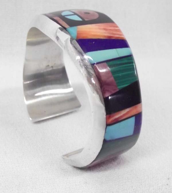 Navajo Sterling Inlay Bracelet - Alvin Yellowhorse: Navajo Sterling Inlay Bracelet-Alvin Yellowhorse. Expertly cut and set stone to stone inlay of various stones - turquoise, lapis, jet, malachite, coral, and sodalite. The sterling silver bracelet is q