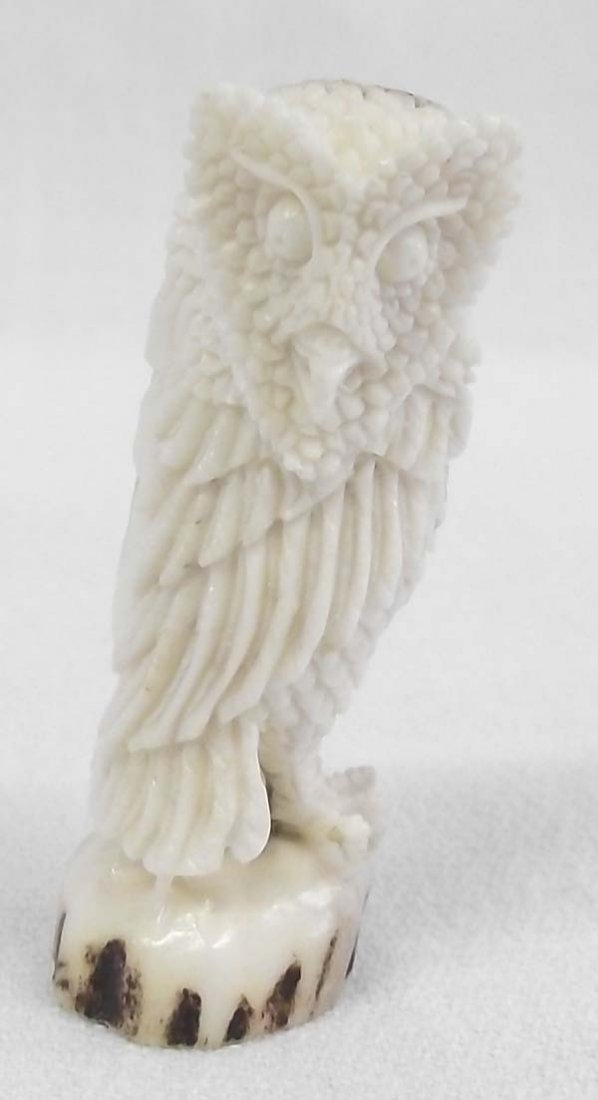 Balanese Antler Carved Owl Fetish: Balinese Antler Carved Owl Fetish. Intricate feathering from the carver specializing in bone, horn and stone carvings. 2''H x 3/4'' wide. Owl fetishes usually mean the protector of the home. He repres