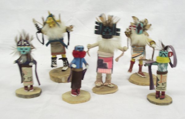 6 Miniature Hopi Zuni Kachinas: 6 Miniature Hopi Zuni Kachinas. These little guys are all highly decorated and painted and some are signed. Three of them have broken or missing parts. The tallest is the mudhead, at 5.25''Hx2-7/8''W.