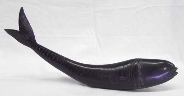Indonesian Carved Buffalo Horn Medicinal Fish Box: Vintage Indonesian Carved Buffalo Medicinal Horn shaped like a fish. Carved to store medicinal herbs by the Sasak people on Lombok Island, Indonesia. Head detaches and has some scratches from age. 14'