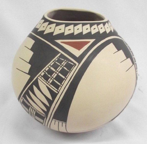 Mata Ortiz Polychrome Jar - Jose Villa: Mata Ortiz Polychrome Jar - Jose Villa. The oval mouth of this bowl is unique. Mata Ortiz is a small village in the state of Chihuahua, Mexico. The potters of Mata Ortiz create contemporary works of a