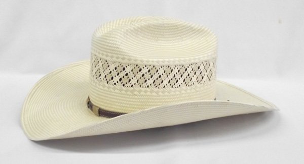 Stetson Chantung Panama Cowboy Hat: Stetson Chantung Panama Cowboy Hat. Fine woven hat with a leather hat band. The brim has a bulge on the front. Size 7.