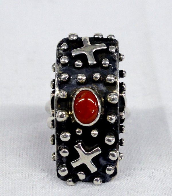 Navajo Sterling Coral Ring - Thompson: Navajo Sterling Coral Ring - Thompson, this ring is quite unique in that it is adjustable, unusual shape and design features silver beads and x designs, coral cabochon in center, stamped sterling and 