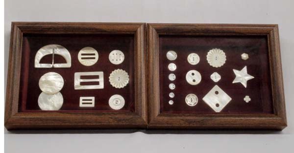 Antique Collection Mother of Pearl Buttons,Buckles: Antique Collection Mother of Pearl Buttons and Buckles in 2 frames. Some are handmade with various button hole styles. Beautiful sheen to the pearls. 24 pieces.