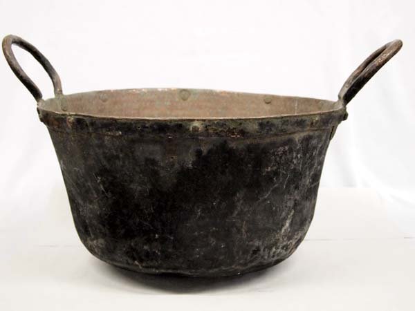 Antique Large Copper Handled Bucket: Antique Large Copper Handled Bucket. 13''H x 22'' W. Heavy. Small hole in bottom. Some dents. Wonderful patina. Item found on private ranchland near Arabela-Bluewater in South Central New Mexico.