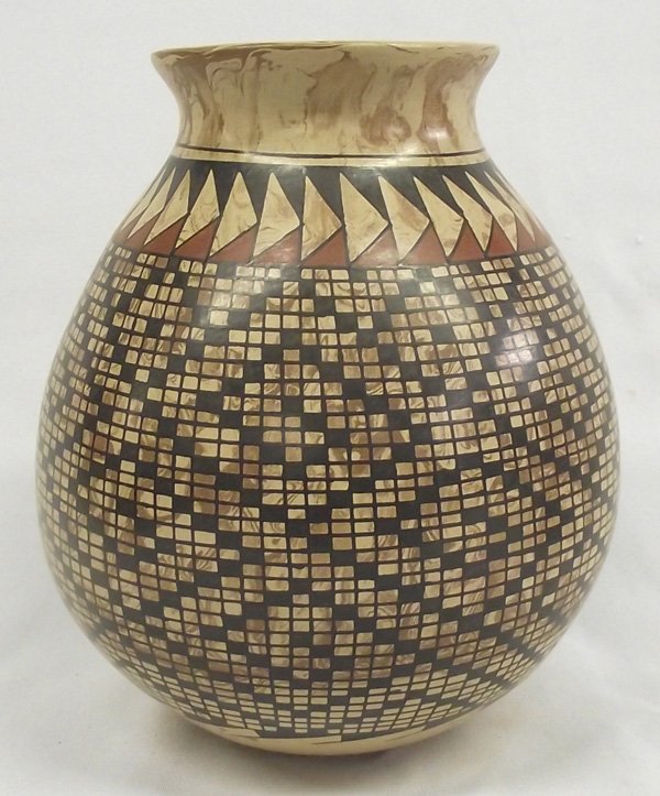 Mata Ortiz Marbleized Eye Dazzler Jar - L Ortiz: Mata Ortiz Marbleized Eye Dazzler Jar - L Ortiz. Dazzling diamonds on a marbleized background on this jar by Louis Ortiz from Mata Ortiz, Mexico. Measures 7.25''Hx6.5''W. Mata Ortiz is a small village