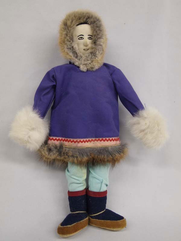 Eskimo Doll: Eskimo Doll. Leather boots and rabbit fur trimming, this doll is 14.5''L x 10''W.