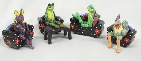 Albezia Wood Carvings, Furniture & Jointed Animals: Albezia Wood Carvings, Furniture & Jointed Animals. Whimsical seated critters, each on carved wood couches. Each animal's arms and legs are jointed, so they can be positioned. Set includes 1 sofa, 3 c