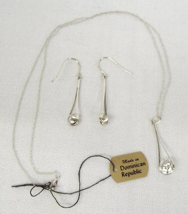 Dominian Republic Crystal Cut Necklace and Earrings: Matching Sterling Earrings & Necklace. Crystal cut Dominican Republic stones in each earring and the pendant in tear drop settings. The chain is marked 14kt JMC and measures 18'' end to end. The penda