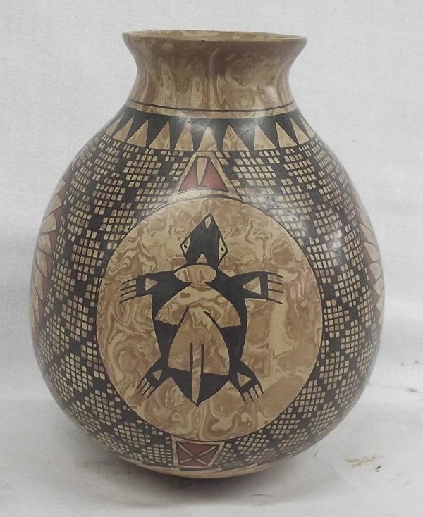 Mata Ortiz Turtle Sunflower Jar - Luis Ortiz: Mata Ortiz Turtle Sunflower Jar - Luis Ortiz. The artist has precisely painted four circles, two each of sunflowers and turtles on a marbleized background. The main body has diamond designs filled wit