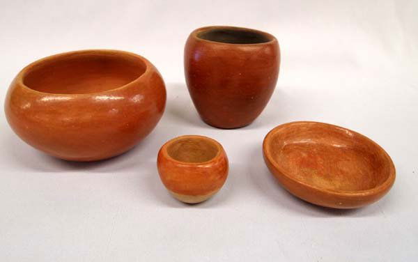 4 Vintage San Juan Pueblo Pottery: Vintage San Juan Pueblo Pottery, Set of 4. Largest measures 2.5''H x 4.5'' diameter. One bowl is signed ''Lily'' on the bottom. The beauty is in the simplicity of design and eventually wins over colle