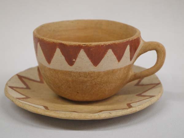 Tarahumara Indian Pueblo Polychrome Clay Cup & Saucer: Pueblo Polychrome Cup and Saucer. Saucer measures 5.75'' diameter. Cup measures 2.5''H x 4.75'' wide. Impressive to have a set in such good condition.