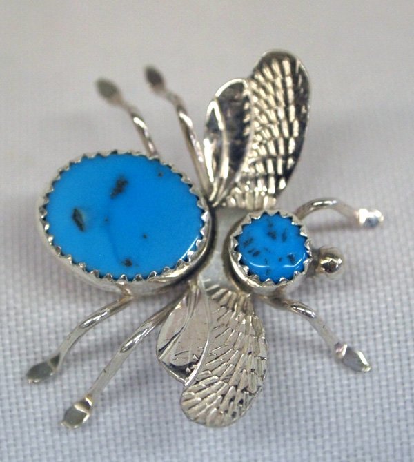 Navajo Sterling Turquoise Insect Pin- JJ: Navajo Sterling Turquoise Insect Pin- hallmarked JJ and stamped sterling. 1'' x 1.25''. Two blue matching turquoise cabochons on insect body are beautiful.