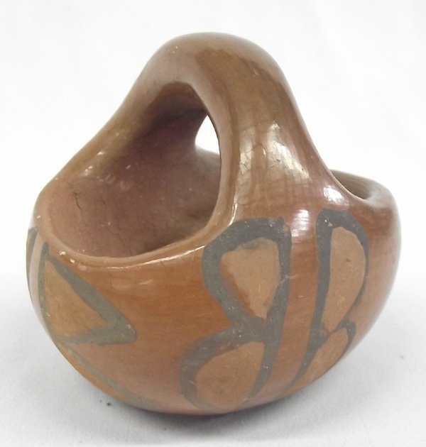 1940s Classic Santa Clara Pottery Bowl Basket: 1940s Classic Santa Clara Pottery Bowl Basket, medium brown accented with 4 terra cotta triangles on both sides outlined in black, terra cotta butterflies on each side of handle outlined in black, med