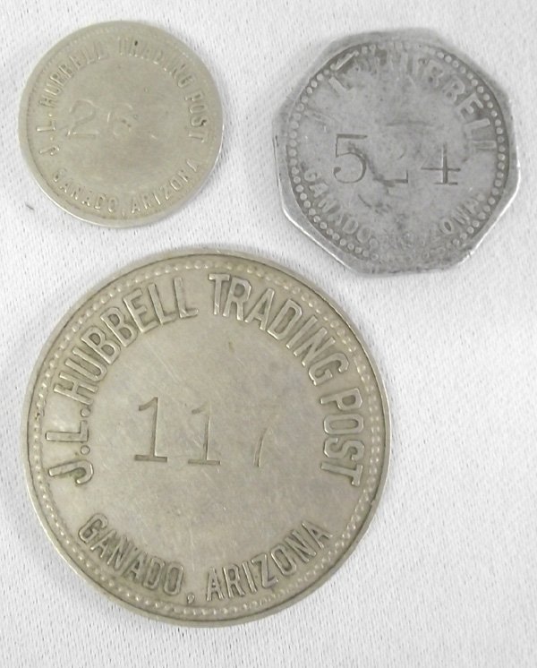 1900s JL Hubbell Trading Post Trade Tokens: 3 JL Hubbell Trading Post, Ganada Arizona, Apache County Trade Tokens. Round $1.00, Six Sided 25 Cent, Round 5 Cent Token.