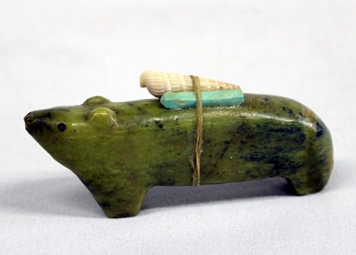 Vintage Zuni Serpentine Bear Fetish: Vintage Zuni Serpentine Bear Fetish, attributed to the Homer family - famous for their Zuni fetishes, has turquoise - pink shell- and a seashell powerpack, drilled eyes and nostrils, gorgeous green se