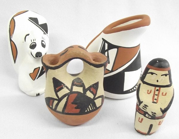 4 Isleta Jemez Mini Pottery - Lucero & Yepa: 4 Isleta Jemez Mini Pottery - Lucero. This group of small wonders includes a cute little squirrel signed on the bottom, ''Lucero Isleta, NM''. The pitcher is signed ''E.O. Isleta Pueblo, N.Mex.'' and 