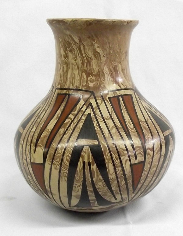 Mata Ortiz Marbelized Jar - Amanda Mora: Mata Ortiz Marbelized Jar - Amanda Mora. Pretty pulled spout jar by Mata Ortiz artist, Amanda Mora. Signed on the bottom. It measures 6.75''H x 6''D.