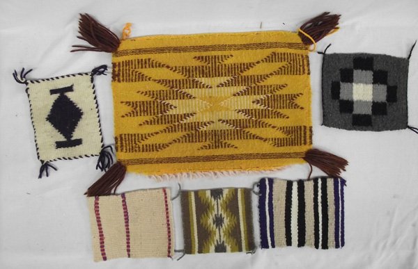 Six Navajo Textiles: Six Navajo Textiles; five small samplers and one 10.5'' H x 15.75''L.