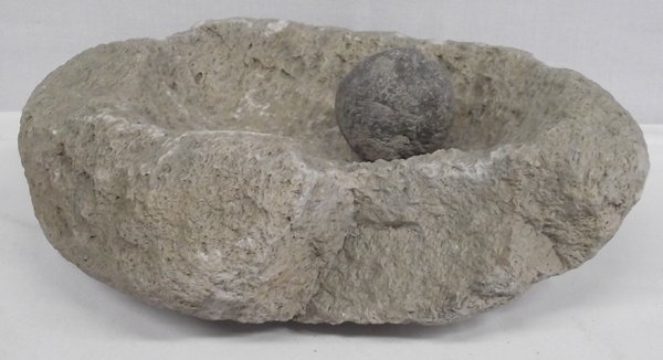 Prehistoric Mimbres Grinding Stone and Mano: Prehistoric Mimbres Grinding Stone and spherical Mano, grinding stone measures 4.5''H x 13''L x 8.5''W, mano is 2.5''D. Acquired in accordance with all State and Federal Regulations.