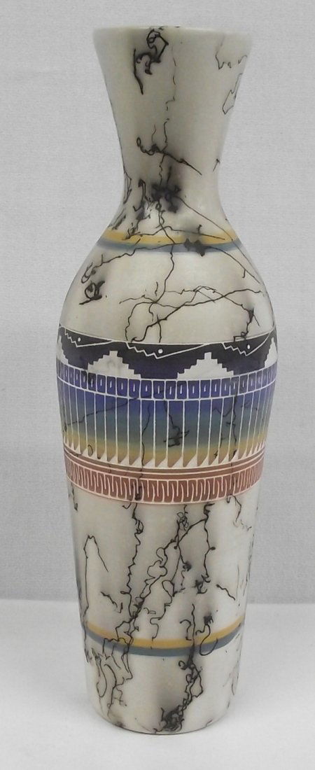 2006 Navajo Horsehair Pottery Polychrome Vase: 2006 Navajo Horsehair Pottery Polychrome Vase, hallmarked ''ay am '06'', pulled spout, graduated hues of blue, green, yellow, and red orange, etched stylized feathers and other geometric designs, meas