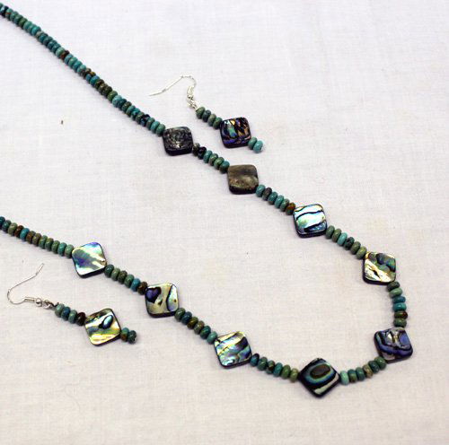 Navajo Turquoise & Abalone Necklace & Earrings: Navajo Turquoise & Abalone Necklace & Earrings. Beautiful combination of turquoise rondels and abalone beads by Mary Begay. The necklace measures 24'' end to end and the earrings, fish hook style, mea