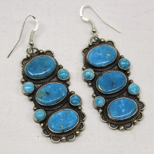 Vintage Navajo Turquoise & Silver Earrings: Vintage Navajo Turquoise & Silver Earrings. Striking pair of large vintage Navajo fish hook style earrings by silversmith Dean Brown. These are dramatic earrings, sterling silver and beautiful sky blu