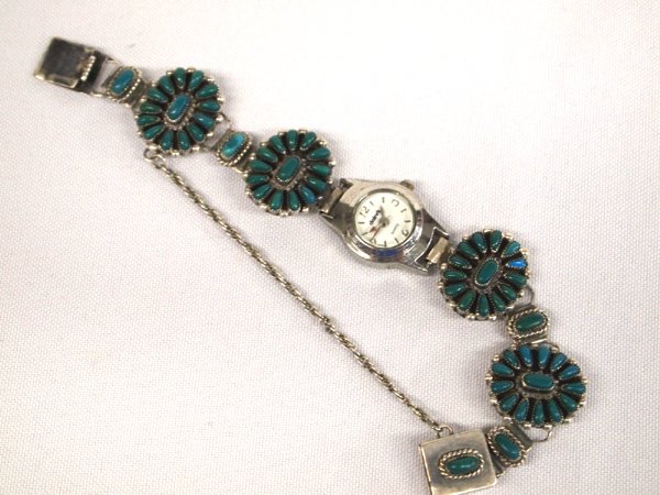 Zuni Sterling & Turquoise Watch Bracelet, Signed: Zuni Sterling & Turquoise Watch Bracelet, Signed by Native American Zuni artist Shirely Hattie. Sterling silver set with petit point green turquoise links, inside measurement 6''. Watch is running. Ha