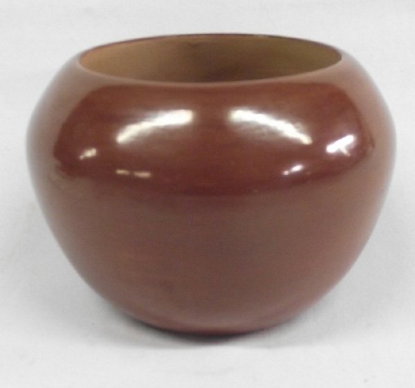 San Juan Bowl -- Domingcita M. Naranjo: San Juan Bowl -- Domingcita M. Naranjo, measures 4''H x 6''W, highly burnished deep terra cotta color, signed on bottom and comes with authentication card, nice weight and thick walled, San Ildefonso