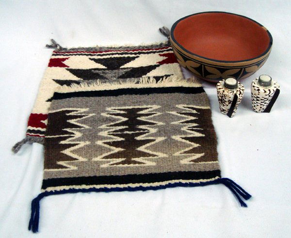 Santo Domingo Bowl, Navajo Rug Sampler & Shell S&P: Santo Domingo Bowl, Navajo Rug Sampler & Shell S&P. Nice lot with Santo Domingo bowl, signed on the bottom ''Cheykaychi'', measures 8''x3''. The rug samplers are 12'' x 11.5'' and 10'' x 12''. The sal
