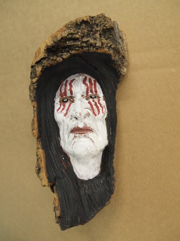 2013 Wood Spirit Carving -- Gordon Raistrick: 2013 Wood Spirit Carving -- Gordon Raistrick, 7.25''H x 3.5''W, Native American Warrior with white and red facepaint, Gordon was born in 1964 on a little Air Force base in New Mexico and has traveled 