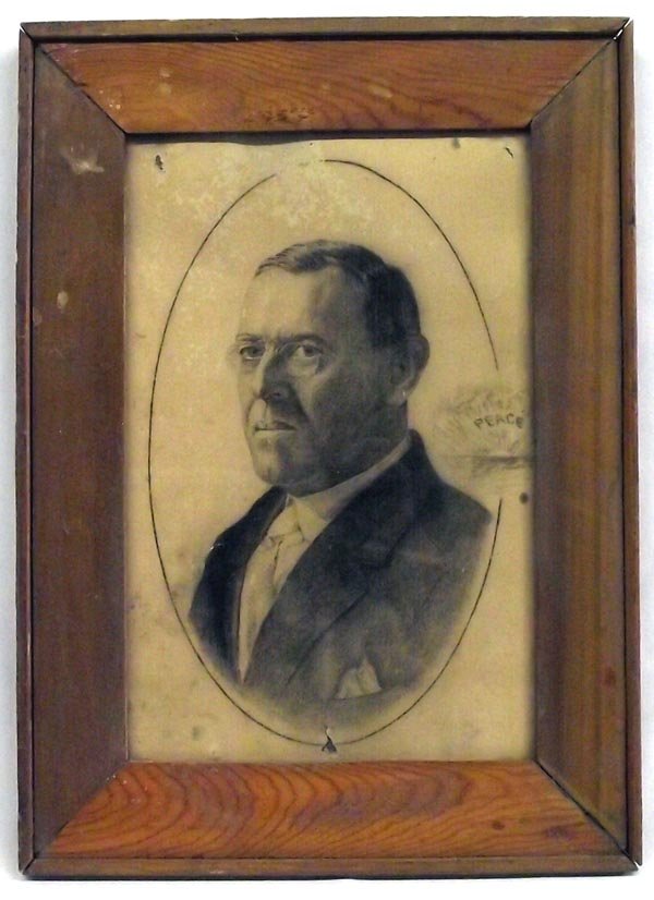 Antique Framed Charcoal Drawing of Woodrow Wilson: Antique Framed Charcoal Drawing of Woodrow Wilson. It's old, but so is Woodrow. The artist has drawn an oval around the portrait and placed a ''PEACE'' thought on the right side of the painting. Very 