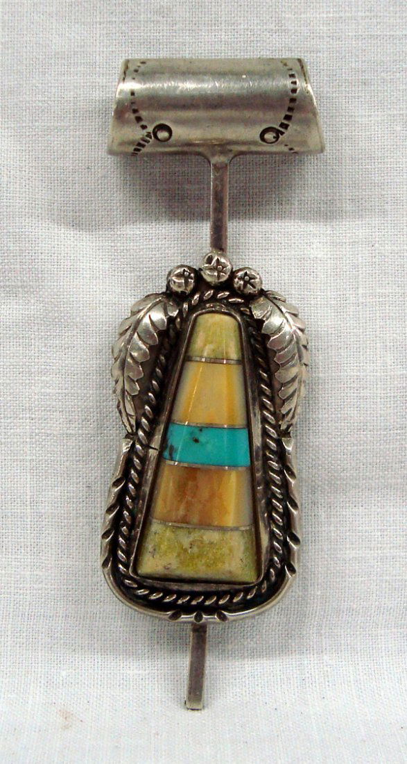 Zuni Sterling Turquoise Channel Inlay Pendant: Zuni Sterling Turquoise Raised Channel Inlay Pendant, featuring turquoise, serpentine, and yellow mother of pearl, traditional silver setting of peyote bead and leaf accents, pendulum style design, be