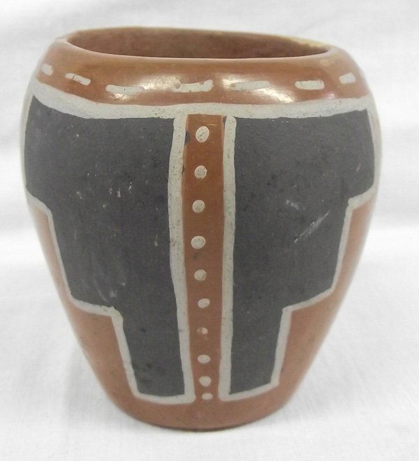 Santa Clara Polychrome Jar - Faustina Gutierrez: Santa Clara Polychrome Jar by Faustina Gutierrez 1898-1976, grandmother of artist Eugene Gutierrez Santa Clara - San Ildefonso artist. Small Polychrome jar signed on the bottom, ''Faustina,'' and meas