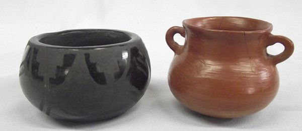 Santa Clara Pueblo Pottery: Santa Clara Pueblo Pottery, #1 black on black, geometric and abstract designs and measures 2''H x 3''W #2 double handled redware olla, has 1'' pressure crack coming off of rim and measures 2.25''H x 3