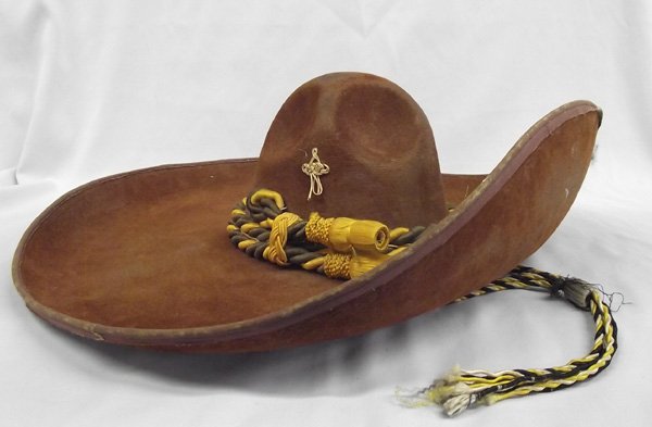 Vintage Mexican Sombrero: Vintage Mexican Sombrero, inside of hat in crown is marked ''Solies Pont Fashion Hats Extra Fino'', measures 5.5''H x 22''W, has 2 gold braided accents on each side of crown and a twisted yellow gold 