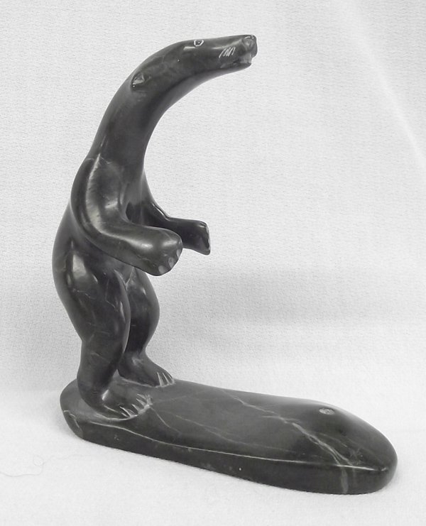 Northwest Coast Soapstone Polar Bear Carving: Northwest Coast Soapstone Polar Bear Carving, paper label on bottom reads: ''Canada Eskimo art esquimeu'', hallmarked on bottom and numbered, measures 4.5''H x 4''L x 1.5''W